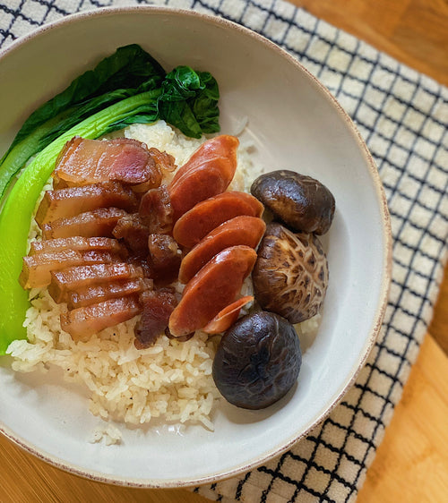 tsui tak lap yuk and lap cheong makes the best clay pot rice dinner. chinese mushrooms paired with chinese vegetables and rice